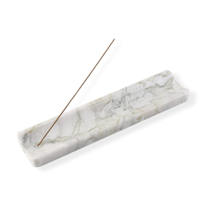 Koville natural marble incense holder slanted hole in Bianco Palomino with burning incense stick