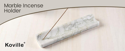 Koville natural marble incense holder slanted hole in Bianco Palomino with burning incense stick