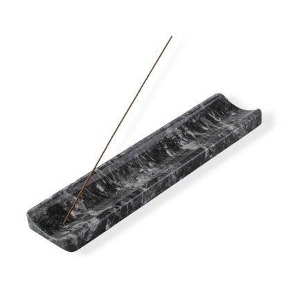 Koville natural marble incense holder slanted hole in Grigio Carnico with burning incense stick