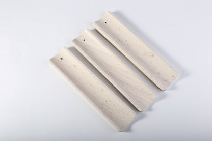 Koville natural marble incense holder slanted hole in Moca Crema with burning incense stick