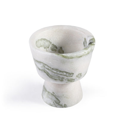 Koville natural marble king cup diffuser in Bianco Palomino on a shelf diffusing essential oils