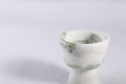 Koville natural marble king cup diffuser in Bianco Palomino on a shelf diffusing essential oils