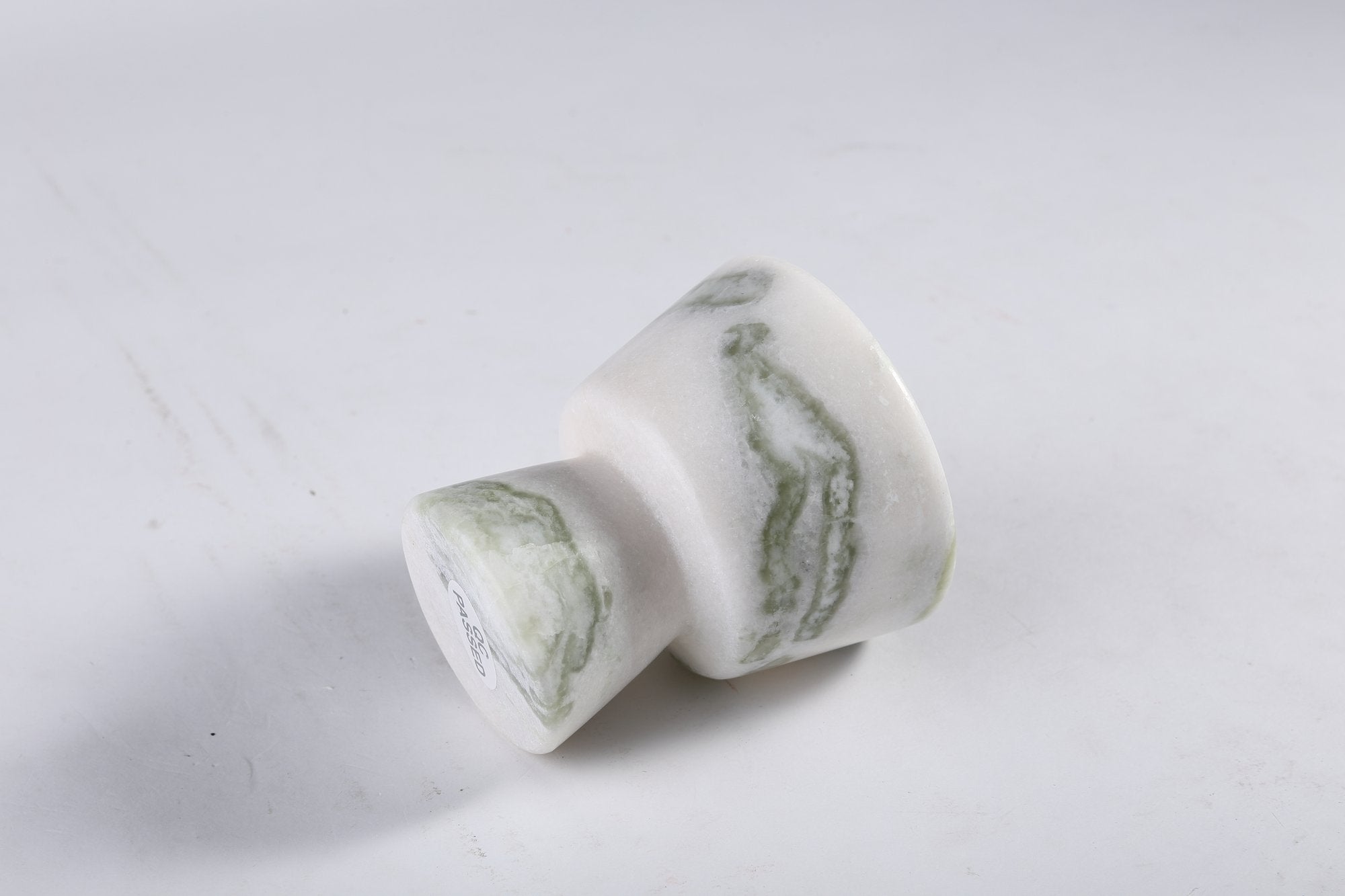 Koville natural marble king cup diffuser in Bianco Palomino on a shelf diffusing essential oils