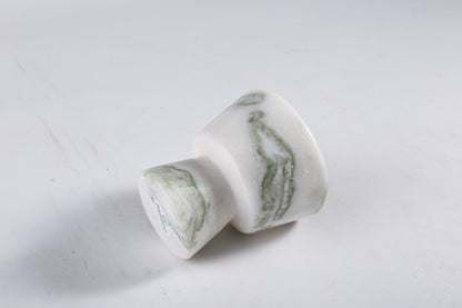 Koville natural marble king cup diffuser in Bianco Palomino on a shelf diffusing essential oils