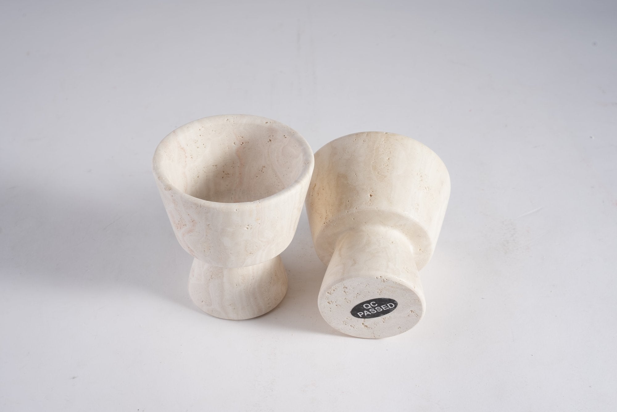 Koville natural marble king cup diffuser in Light BeigeTravertine on a shelf diffusing essential oils