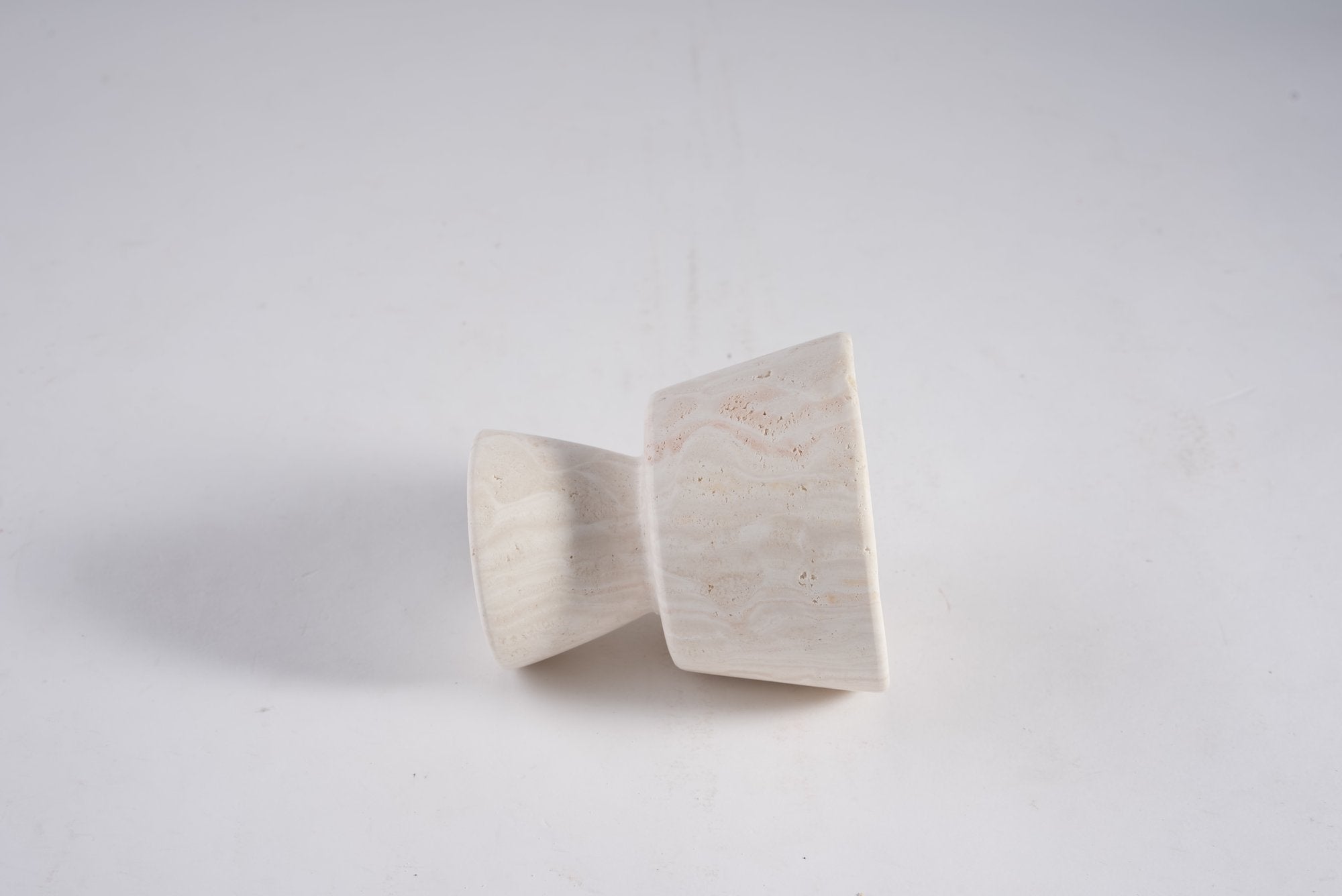 Koville natural marble king cup diffuser in Light BeigeTravertine on a shelf diffusing essential oils