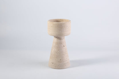 Koville natural marble lighthouse candle holder h 203 2 in Light BeigeTravertine with a lit tea light candle