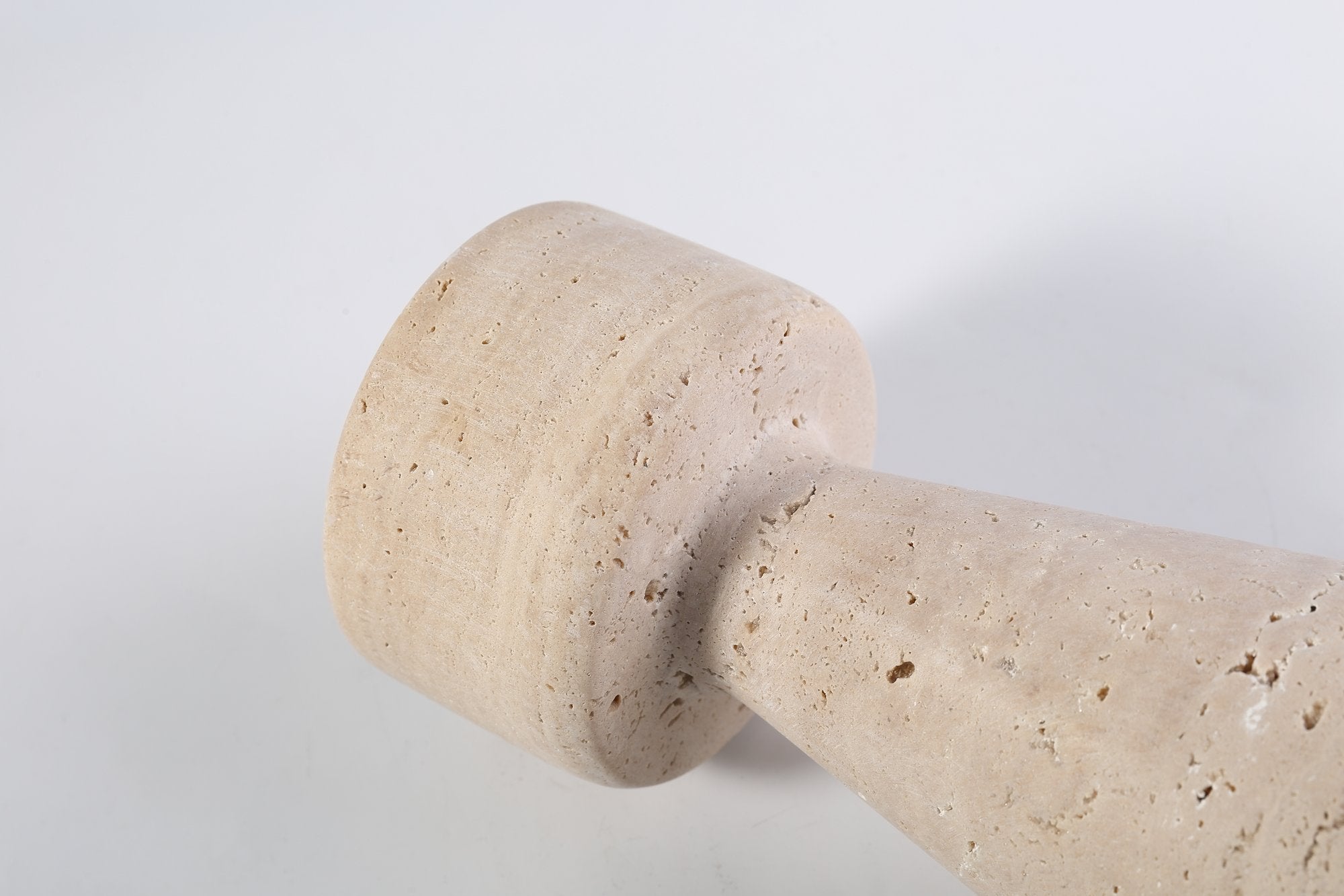 Koville natural marble lighthouse candle holder h 203 2 in Light BeigeTravertine with a lit tea light candle