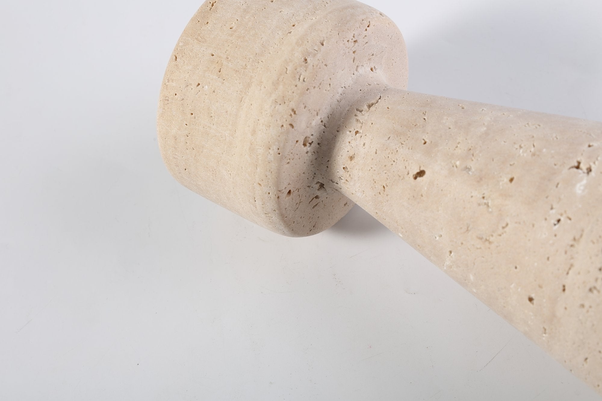 Koville natural marble lighthouse candle holder h 203 2 in Light BeigeTravertine with a lit tea light candle
