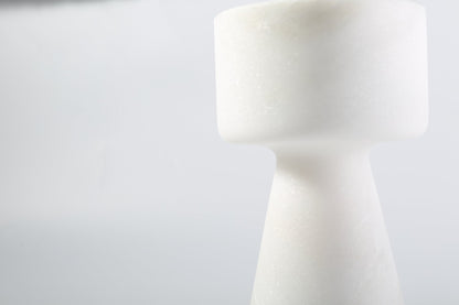 Koville natural marble lighthouse candle holder h 203 2 in Namib Bianco with a lit tea light candle