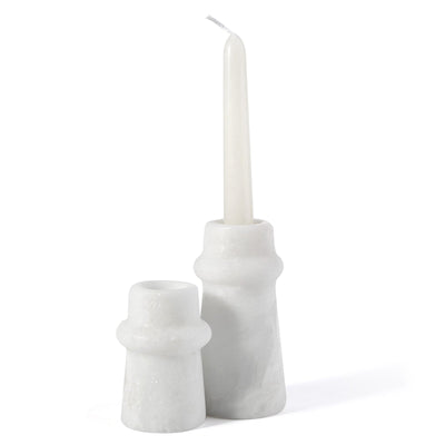 Koville candle holder in Namib Bianco with a lit tea light candle
