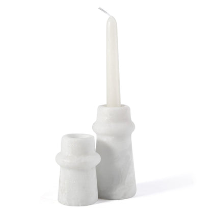 Koville natural marble orbit candle holder d 50 in Namib Bianco with a lit tea light candle