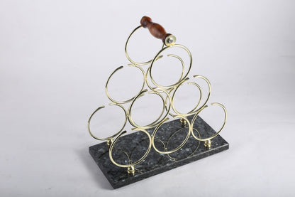 Koville Natural Stone Wine Rack in Blue Pearl on a kitchen counter holding wine bottles