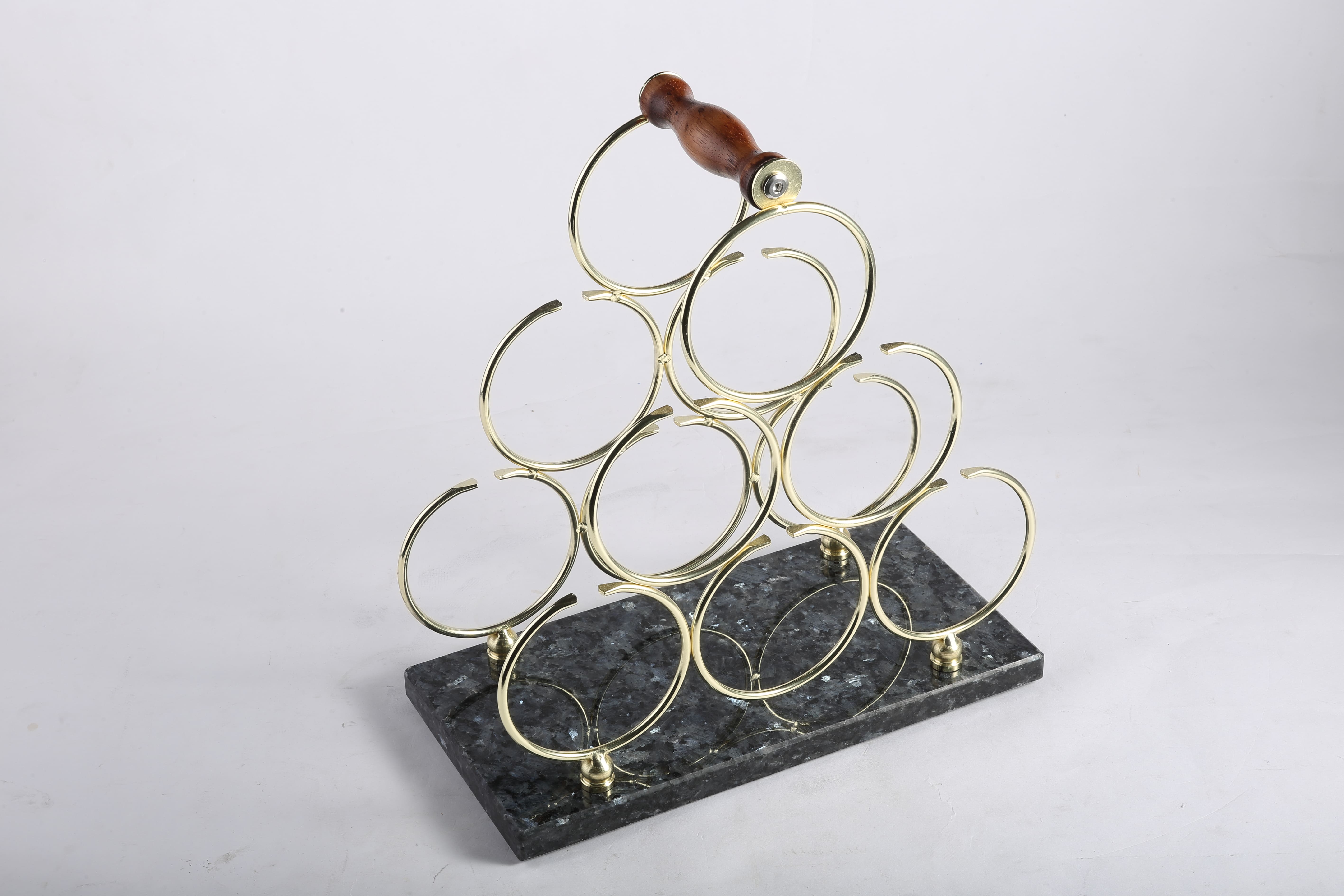 Koville Natural Stone Wine Rack in Blue Pearl on a kitchen counter holding wine bottles