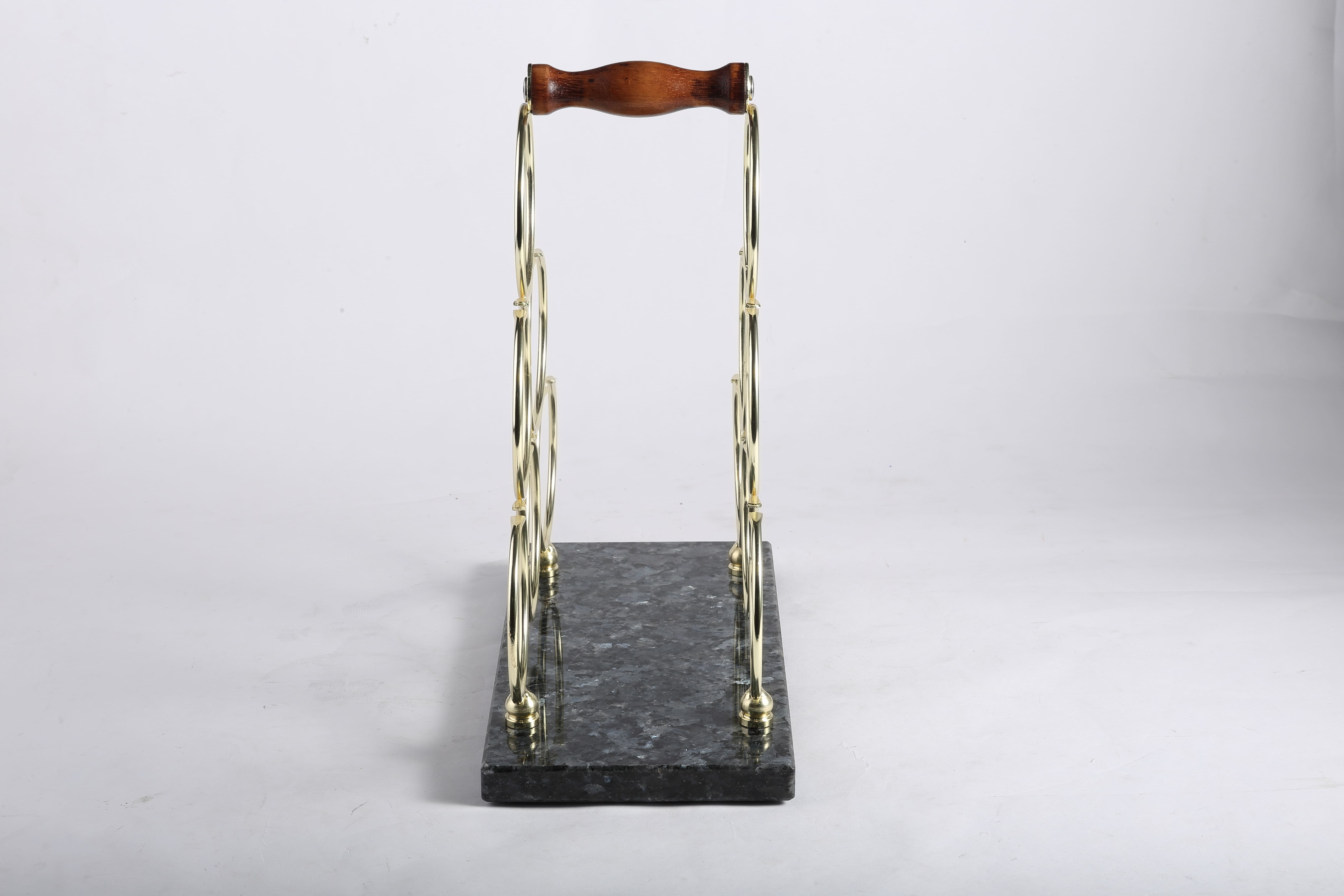 Koville Natural Stone Wine Rack in Blue Pearl on a kitchen counter holding wine bottles