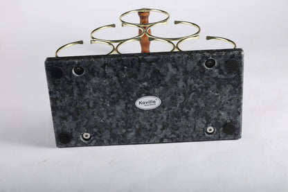 Koville Natural Stone Wine Rack in Blue Pearl on a kitchen counter holding wine bottles