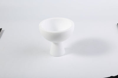 Koville storage cup in Namib Bianco with lid on a vanity counter