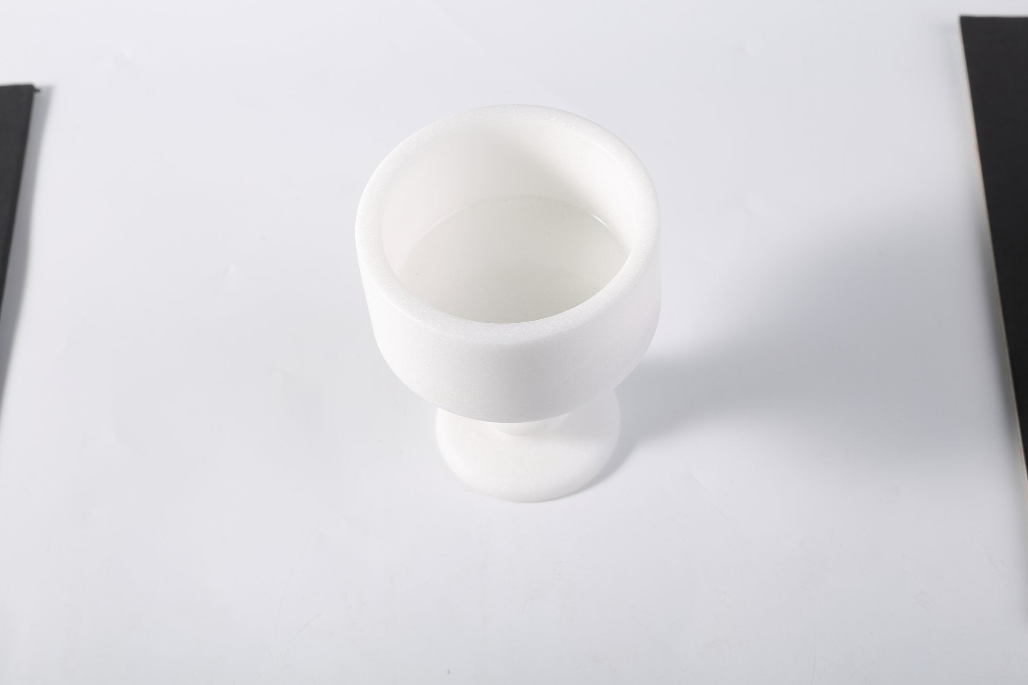 Koville natural marble storage cup 98 125 in Namib Bianco with lid on a vanity counter