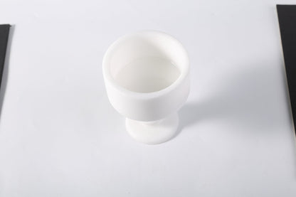 Koville natural marble storage cup 98 125 in Namib Bianco with lid on a vanity counter