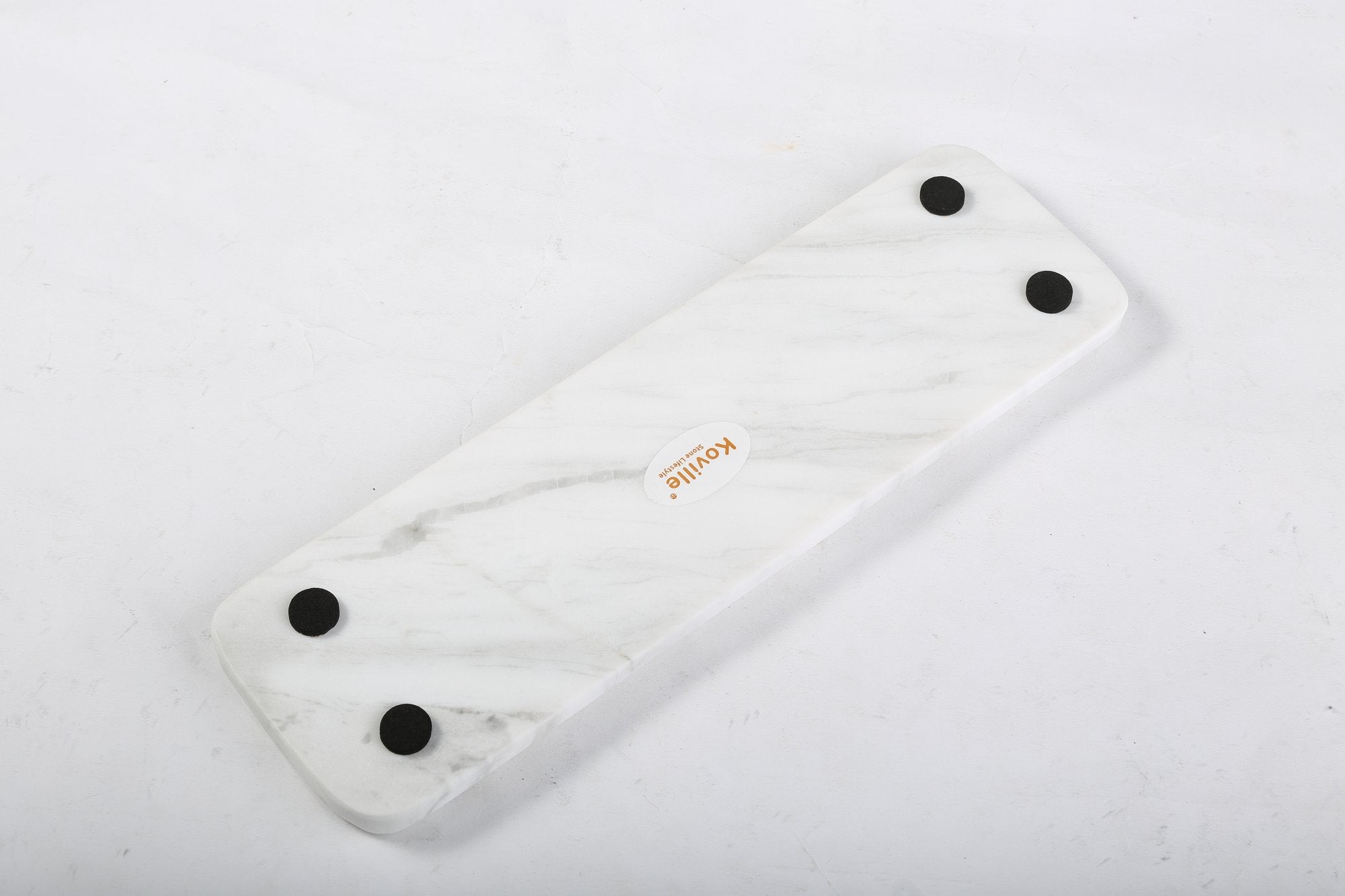 Koville natural marble tea light candle holder 5 holes in Agiax with a lit tea light candle