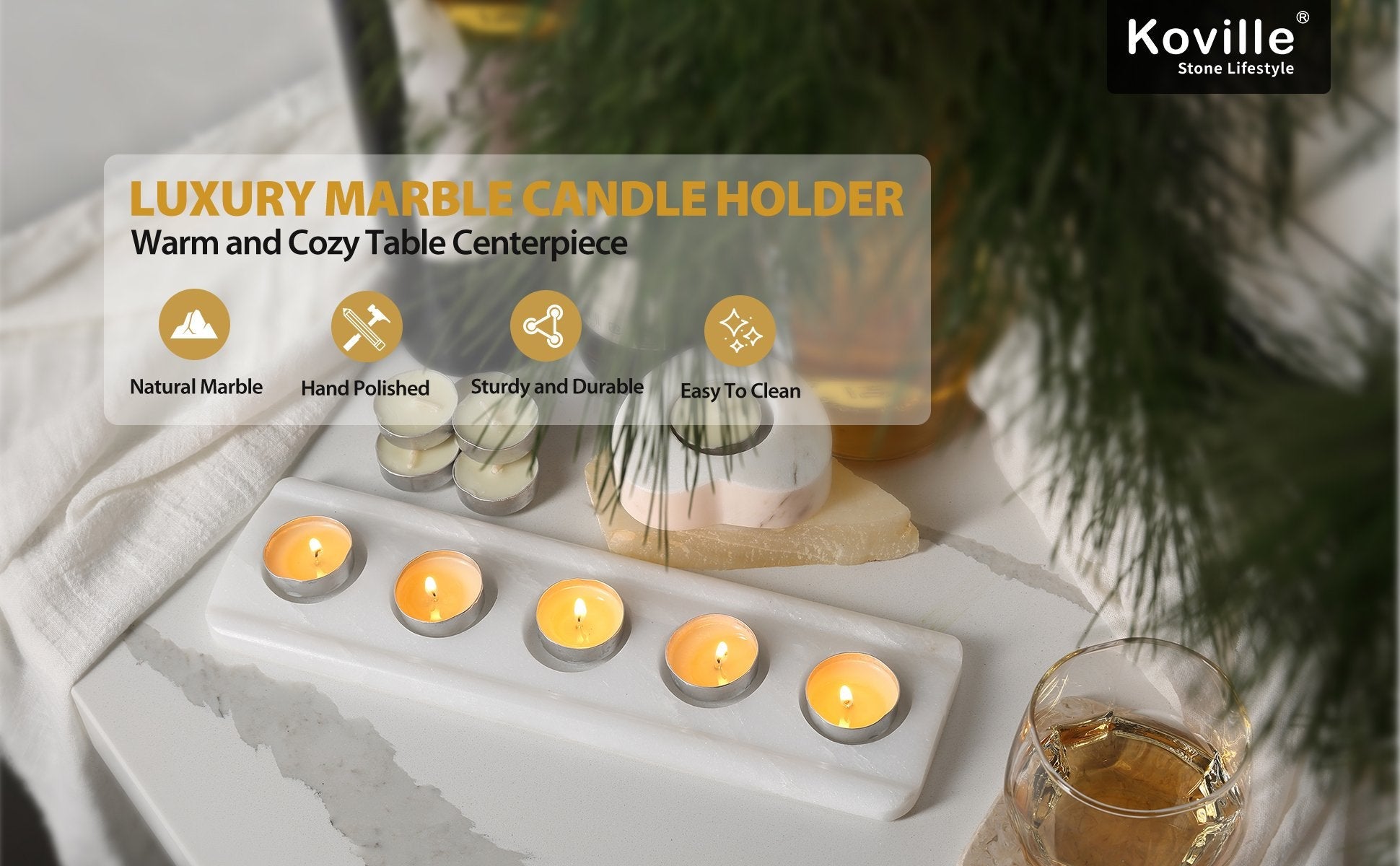 Koville natural marble tea light candle holder 5 holes in Namib Bianco with a lit tea light candle