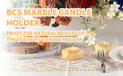 Koville tea light candle holder in Orange Onyx with a lit tea light candle