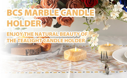 Koville natural marble tea light candle holder t 30 in Orange Onyx with a lit tea light candle