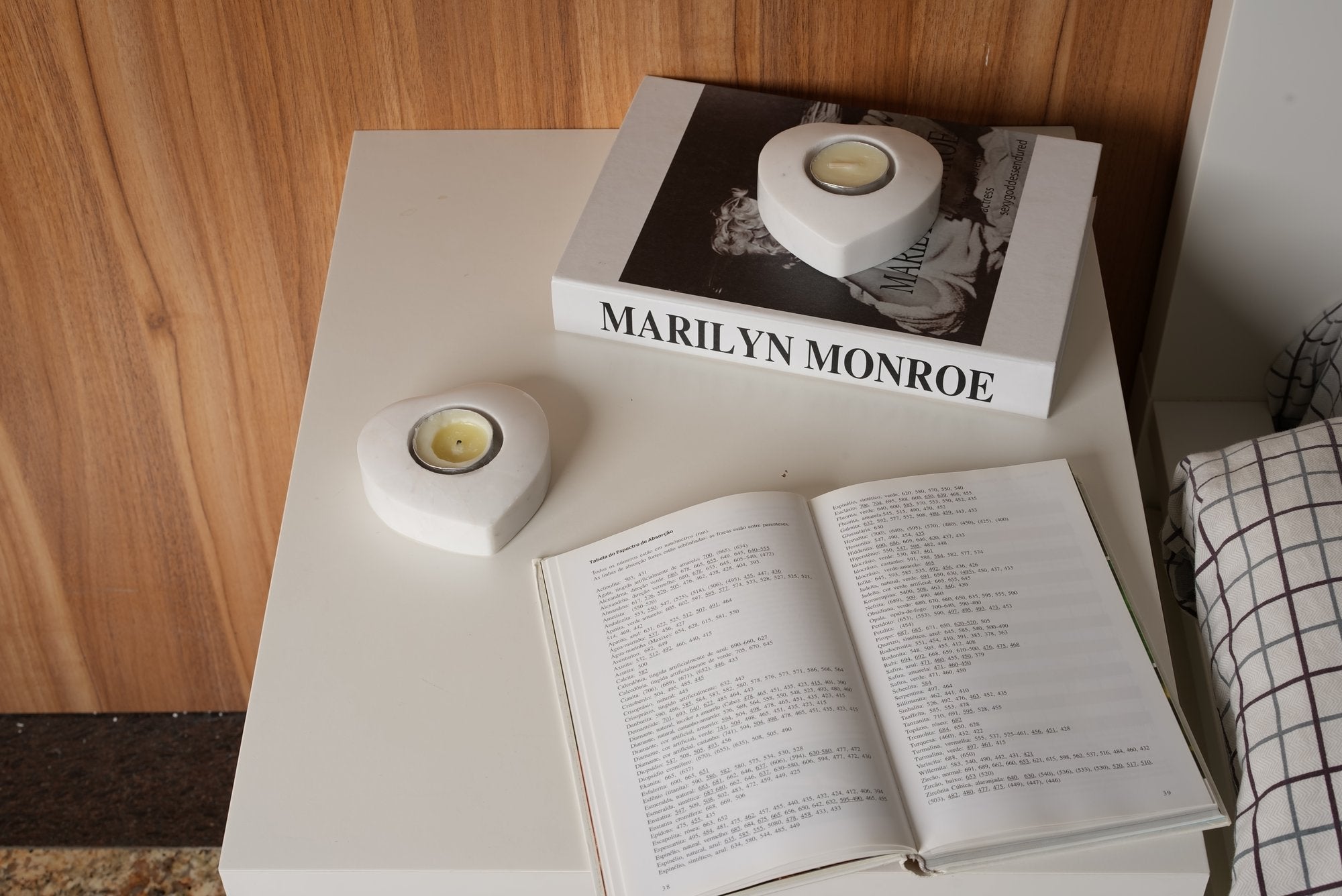 Koville natural marble tea light candle holder t 30 in Sivec with a lit tea light candle