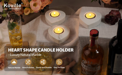 Koville natural marble tea light candle holder t 30 in Sivec with a lit tea light candle