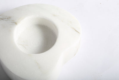 Koville tea light candle holder in Sivec with a lit tea light candle