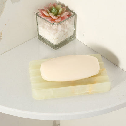 Koville Natural Onyx square wavy soap dish in Green Onyx with sculpted wave surface