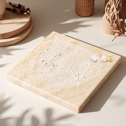 Koville natural stone bas relief tray in Light Beige Travertine - stone surface detail